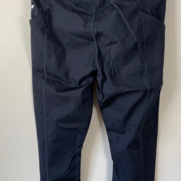 Fabletics High-Waisted Peforated Run 7/8 black - Picture 7 of 10